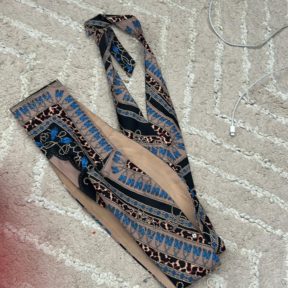 Super cool revolve wrap top
